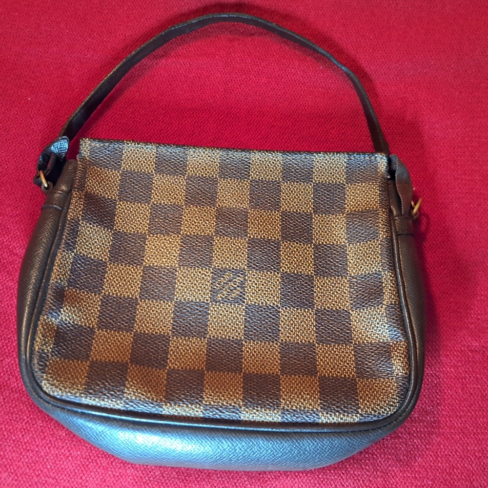 LV  Trousse Purse